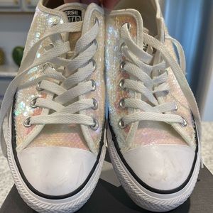 White and pink sequins converse